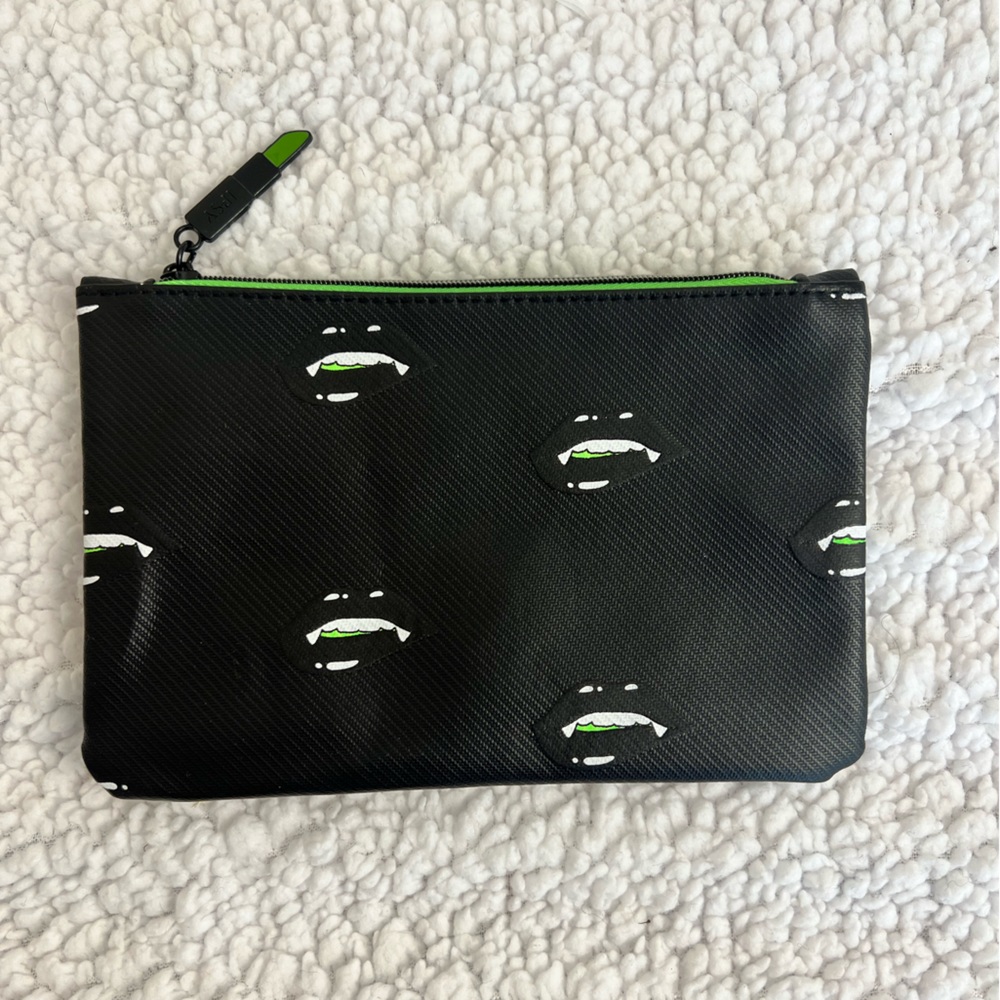 NEW ipsy 2021 October Glam Bag, black with neon green lips with vampire teeth